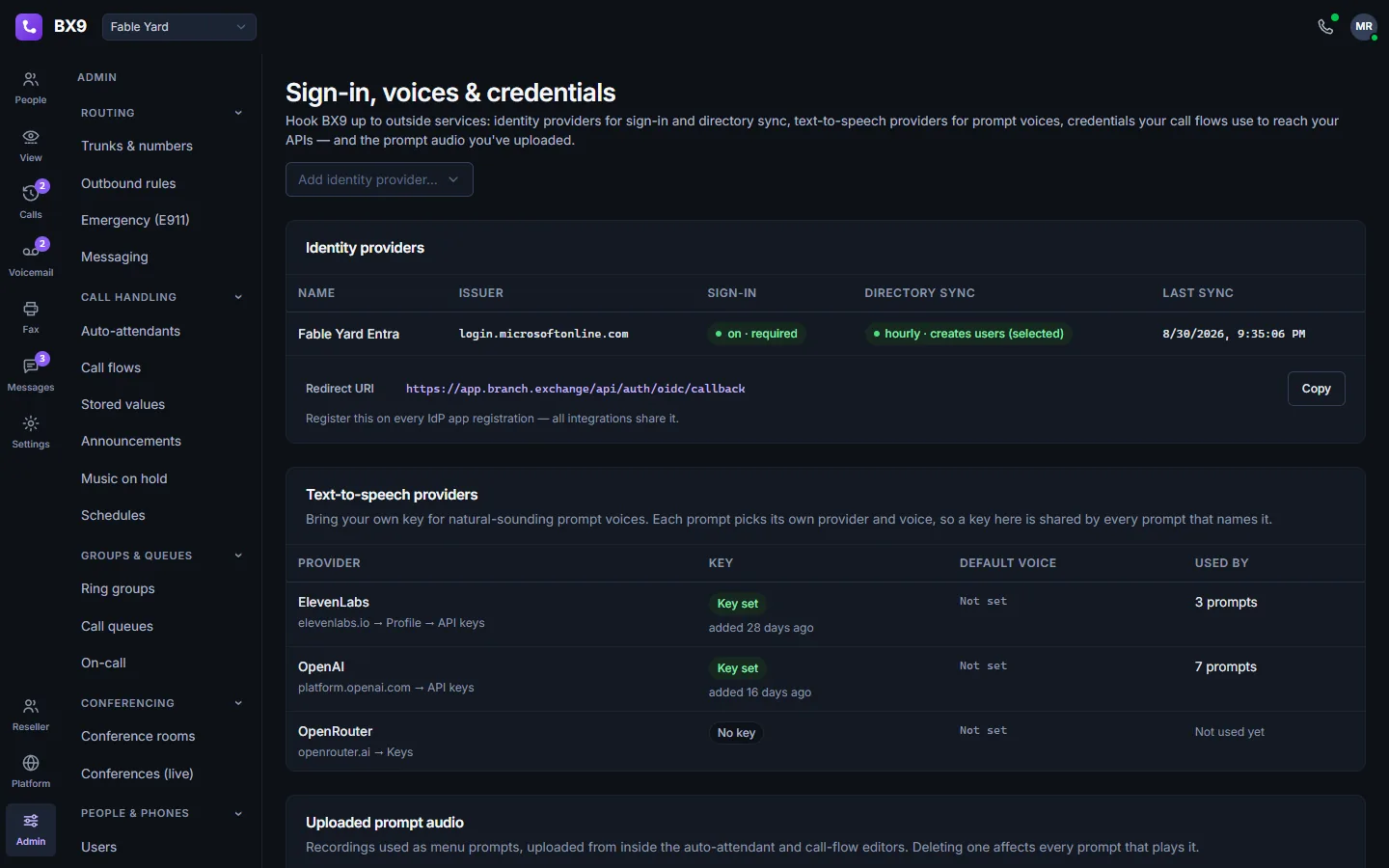 BX9 sign-in settings in dark mode: an identity provider with enforced single sign-on and hourly directory sync, plus the text-to-speech providers used for prompt voices.